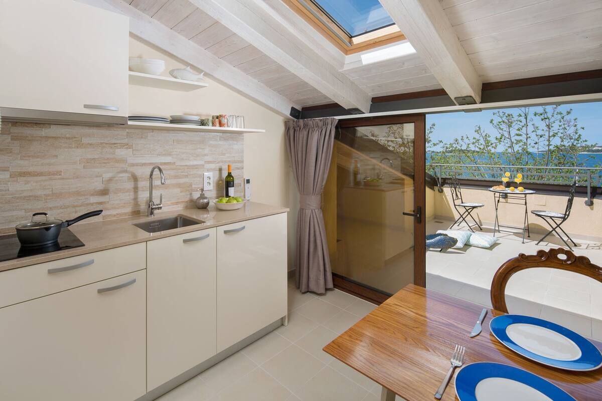 City Apartment, Balcony, Sea View (Attic) | Private kitchenette | Fridge, microwave, stovetop, dishwasher