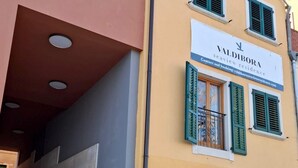 A multi-story building with a sign for Valdibora seaside residence. - Valdibora Seaview Residence (Rovinj)
