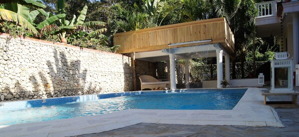 Outdoor pool, a waterfall pool