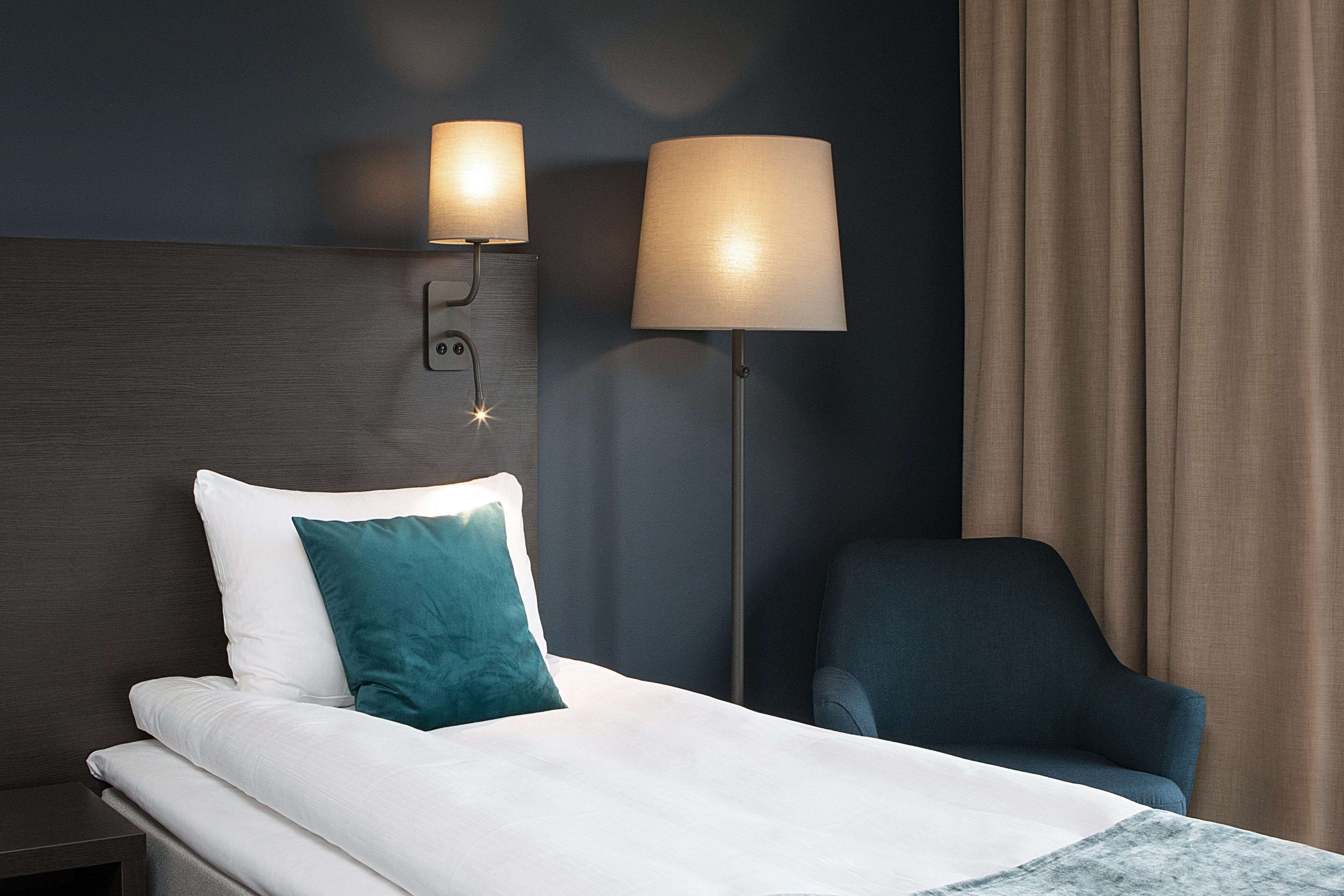 pillow-top beds, desk, blackout curtains, soundproofing