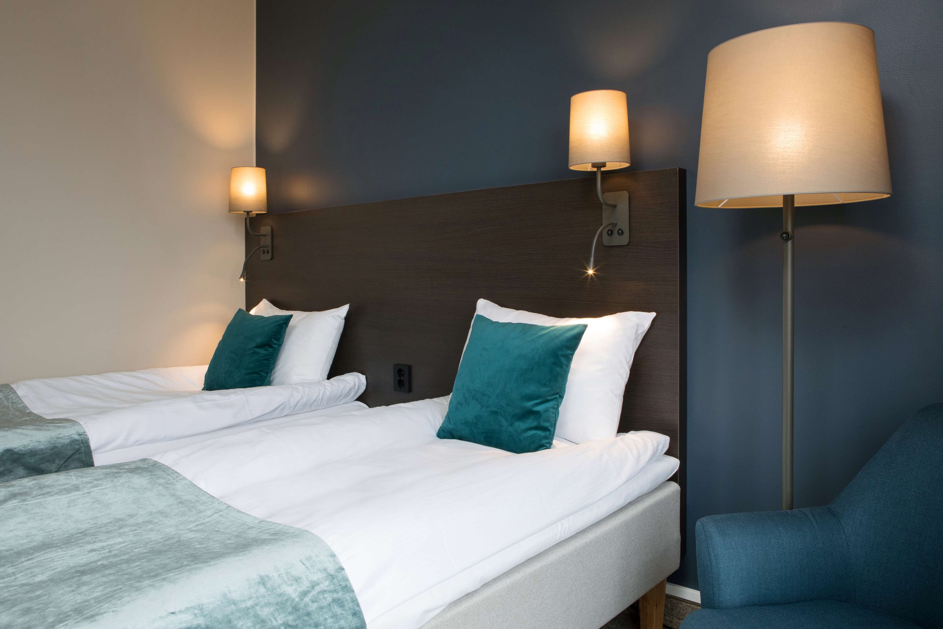 pillow-top beds, desk, blackout curtains, soundproofing