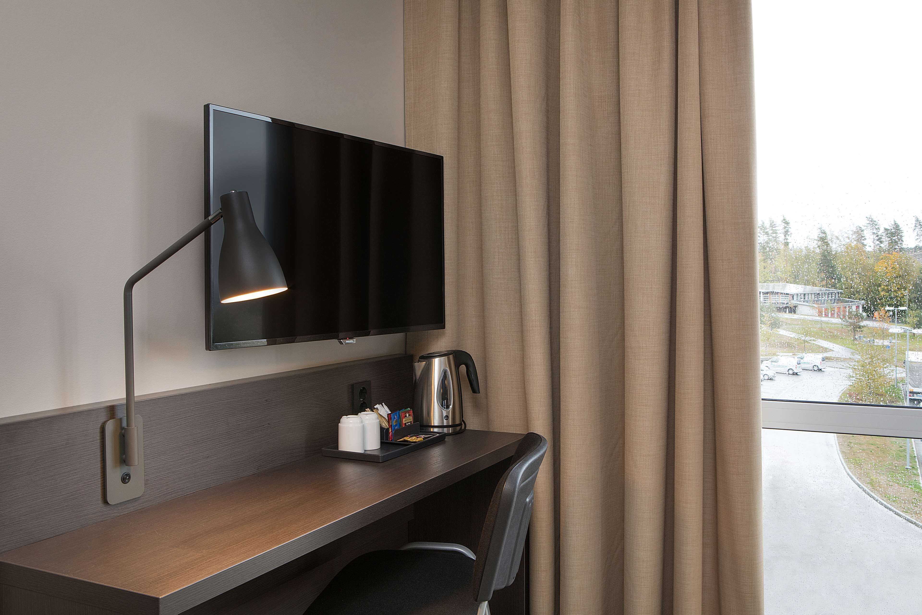 pillow-top beds, desk, blackout curtains, soundproofing