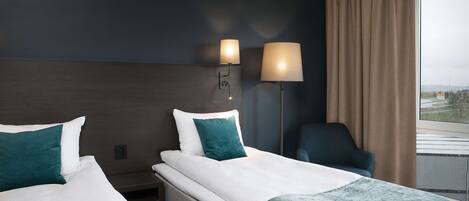 Pillowtop beds, desk, blackout drapes, soundproofing