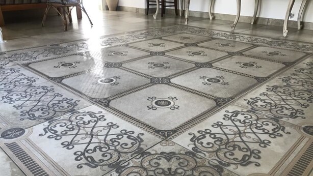 A large, ornate floor with intricate patterns and a central medallion design. - Le Tenute di Agnese (Alliste)