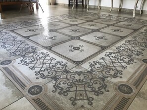 A large, ornate floor with intricate patterns and a central medallion design. - Le Tenute di Agnese (Alliste)