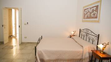 Deluxe Quadruple Room | Egyptian cotton sheets, premium bedding, down comforters, minibar