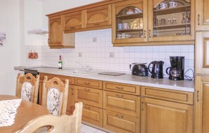 Fridge, stovetop, coffee/tea maker, cookware/dishes/utensils