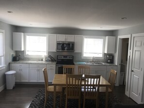 Fridge, microwave, oven, stovetop - Clean, bright apartment with AC and private yard! (Edgartown)
