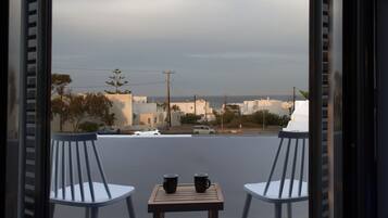 Deluxe-paritalo, 1 keskisuuri parisänky, poreamme, valtameren rannalla (Suite D) | Oleskelualue