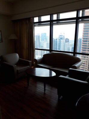Superior Apartment, 1 Bedroom | Living room | Flat-screen TV, ping pong