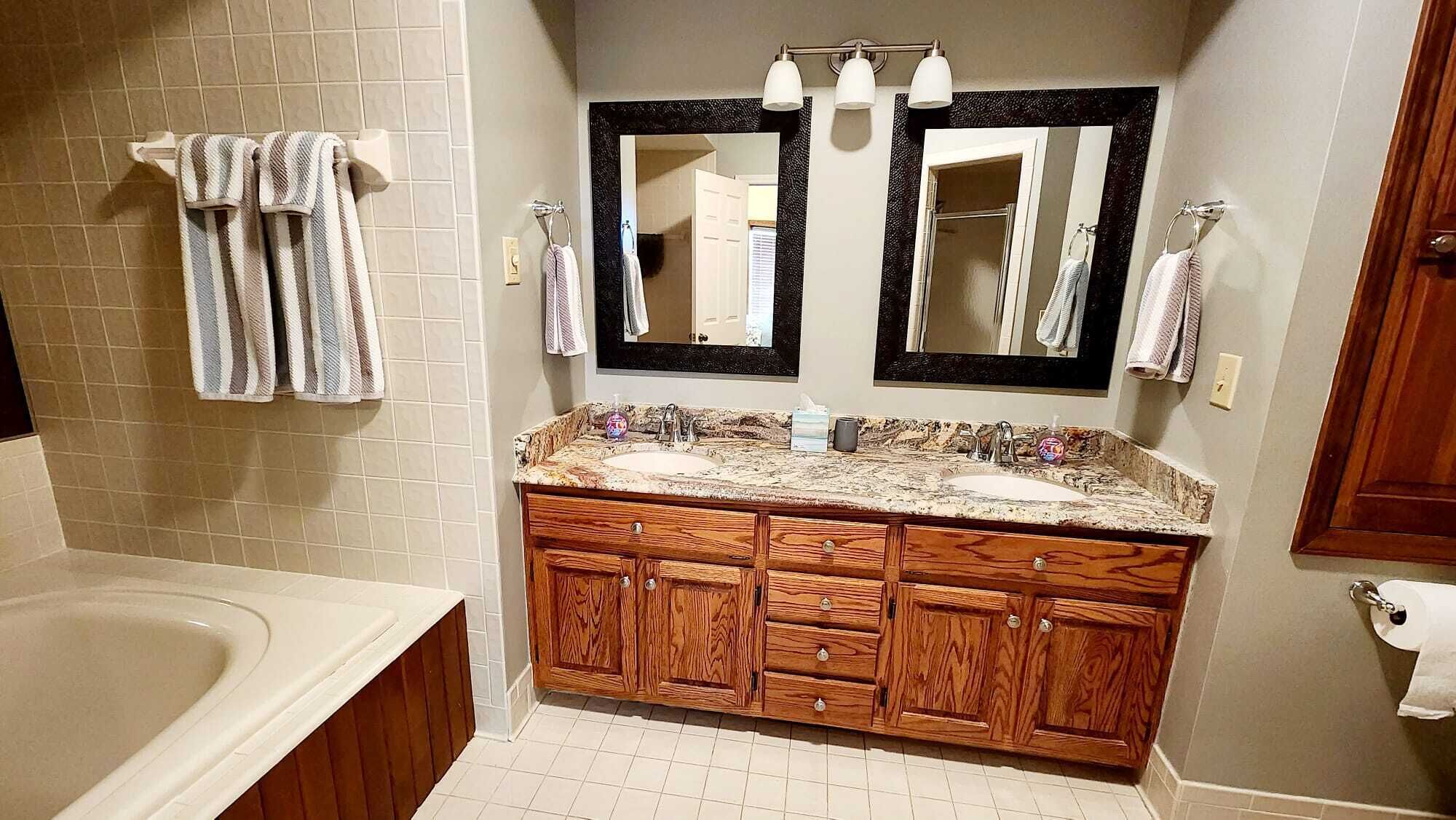 combined shower/bathtub, hair dryer, towels, soap