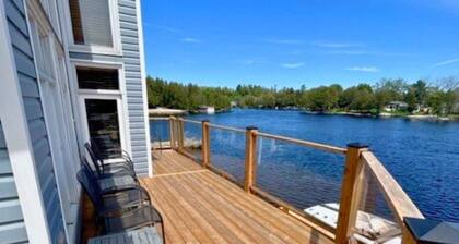 Waterfront Cottage w/ Firepit, Boathouse, Canoes & Game Room