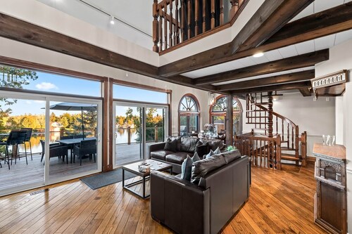 Waterfront Cottage w/ Firepit, Boathouse, Canoes & Game Room