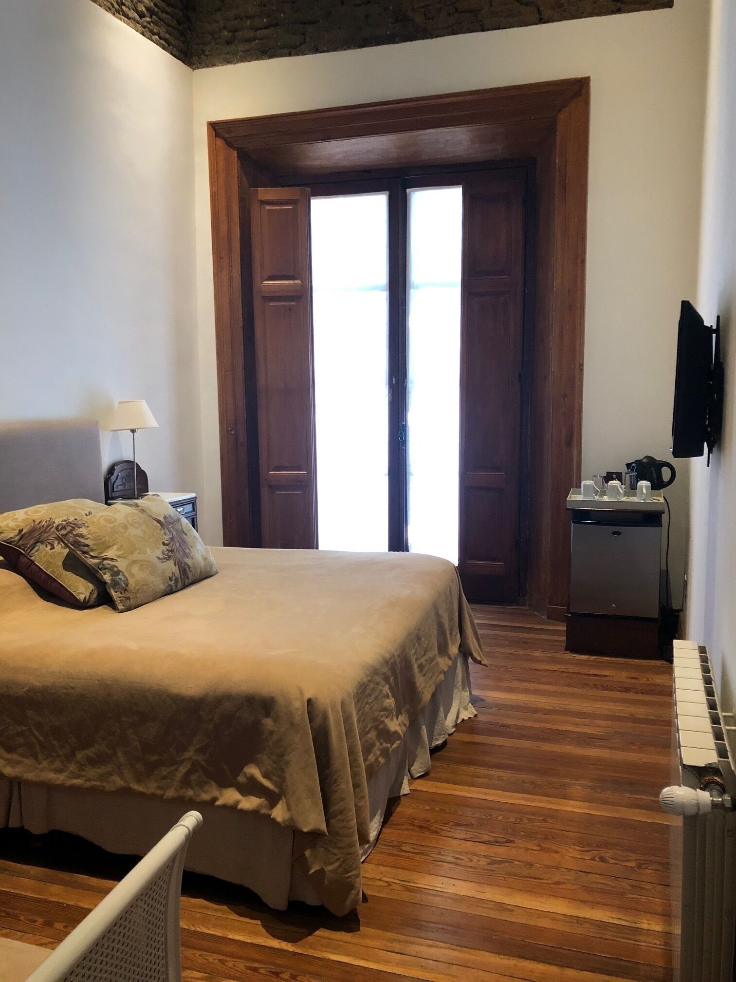 standard triple room, multiple beds, garden view | view from room