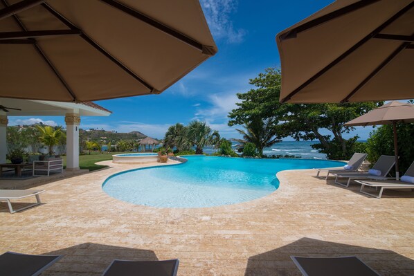 Outdoor pool, pool umbrellas, pool loungers