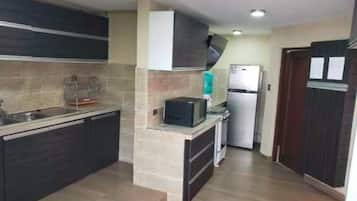 House, 3 Bedrooms | Private kitchen | Full-sized fridge, microwave, stovetop, electric kettle