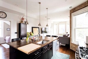 Interior - Soft Leather and Warm Bricks at a Stylish Rogers Park Home (Chicago)