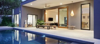 Contemporary home within beachfront gated community