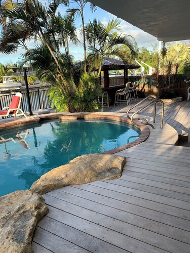 Venetian Shores Escape! Heated Pool, 3BR, 70ft Dock, Dog-Friendly!