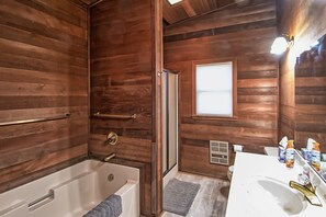 Bathtub, hair dryer, towels, soap