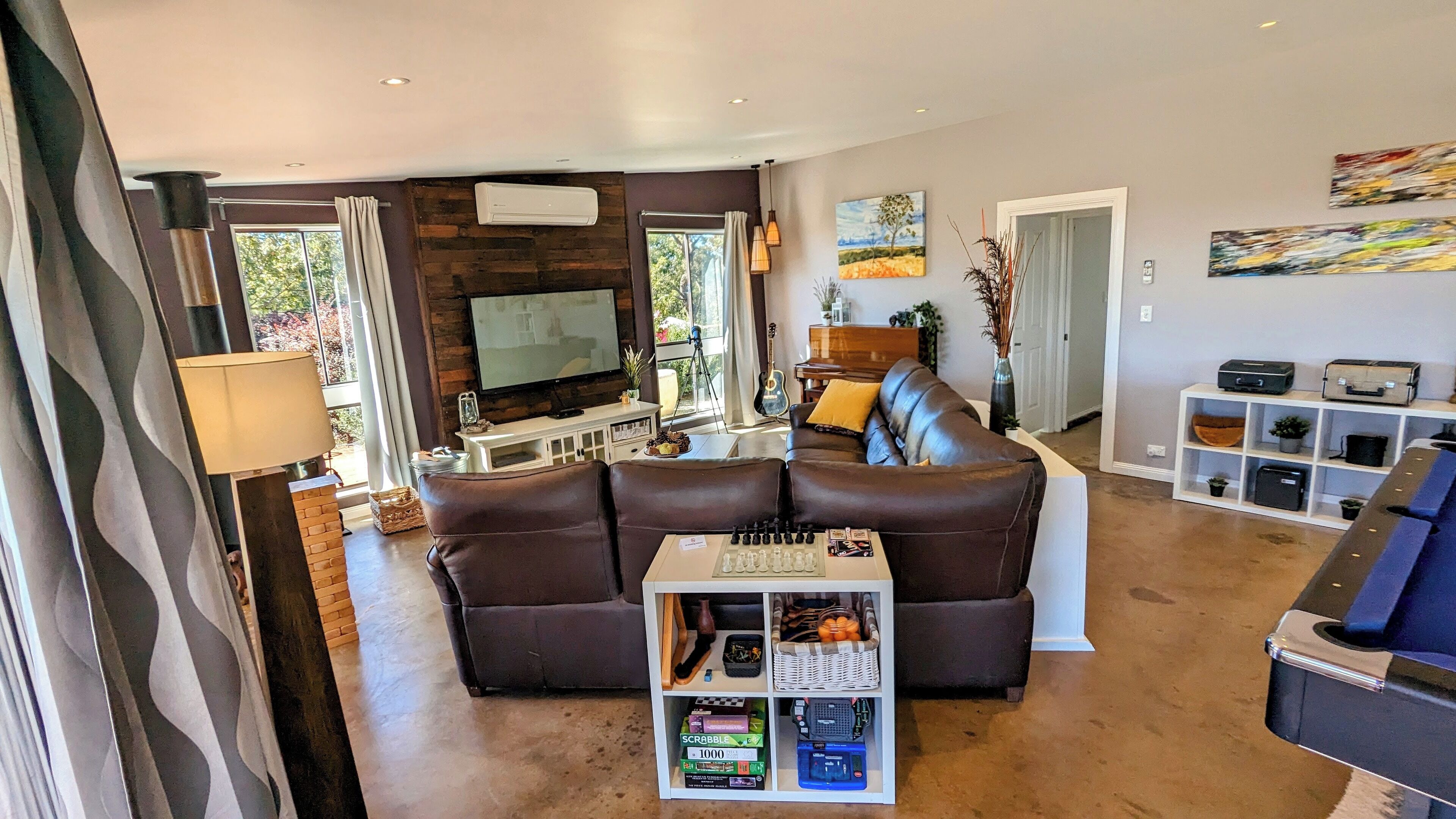 Flat-screen TV, fireplace, video games, DVD player