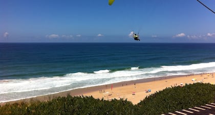 A few meters from a magnificent beach for surfing.