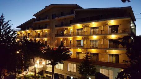 Front of property – evening/night. Al Sakhra Hotel