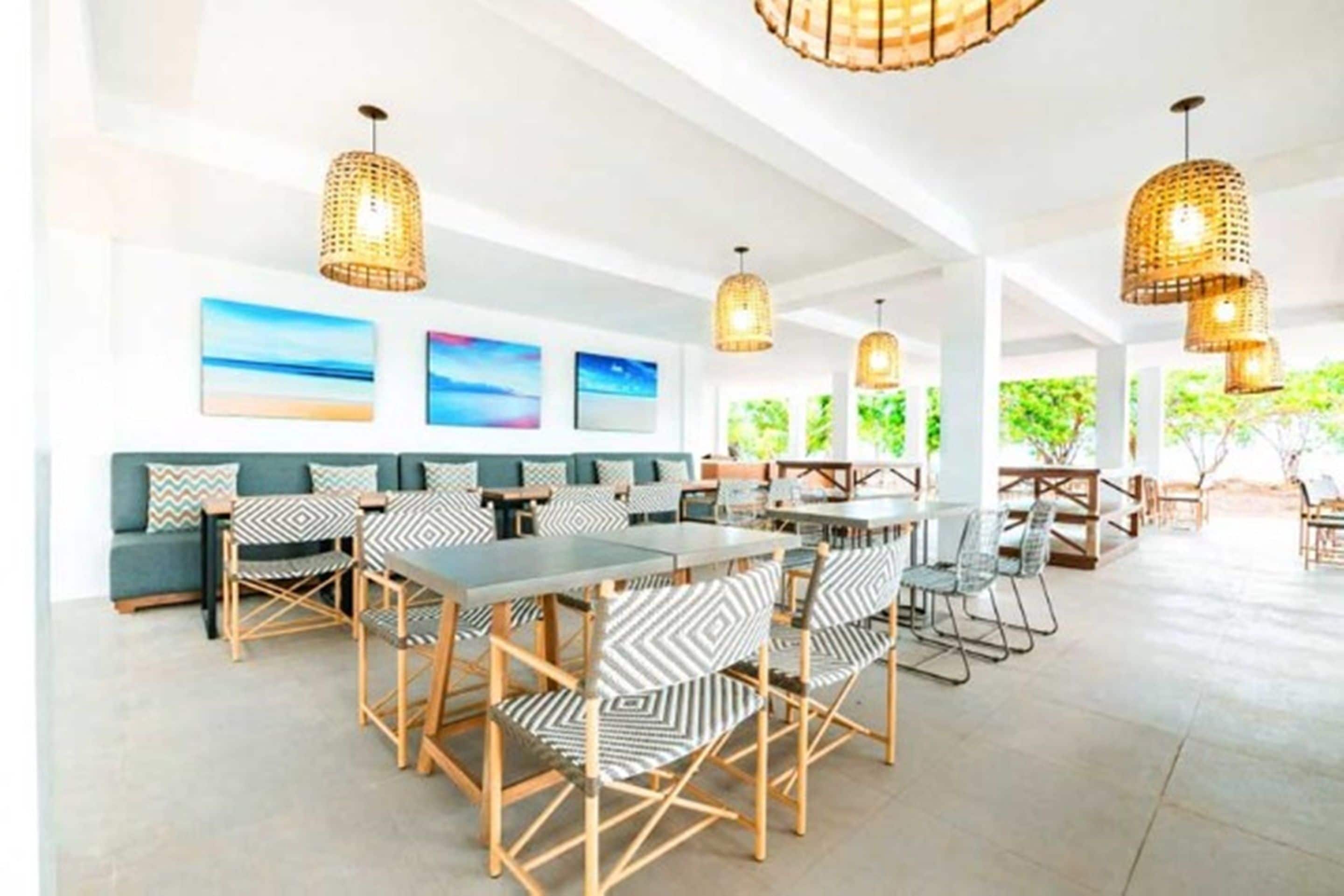 Breakfast, lunch served; local and international cuisine, beach views 