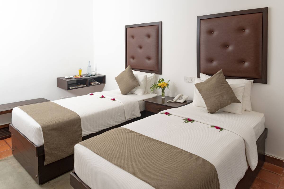 Deluxe Double or Twin Room, 1 Queen Bed, Non Smoking, Pool View | 1 bedroom, premium bedding, minibar, in-room safe