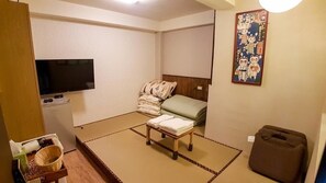 Habitación estándar doble | Escritorio, camas supletorias, wifi gratis y ropa de cama