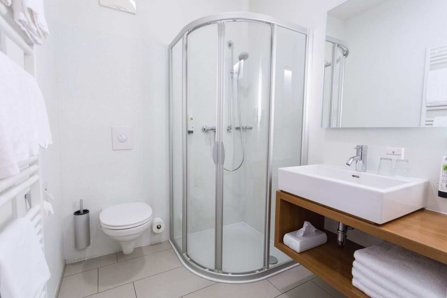 shower, free toiletries, bathrobes, slippers