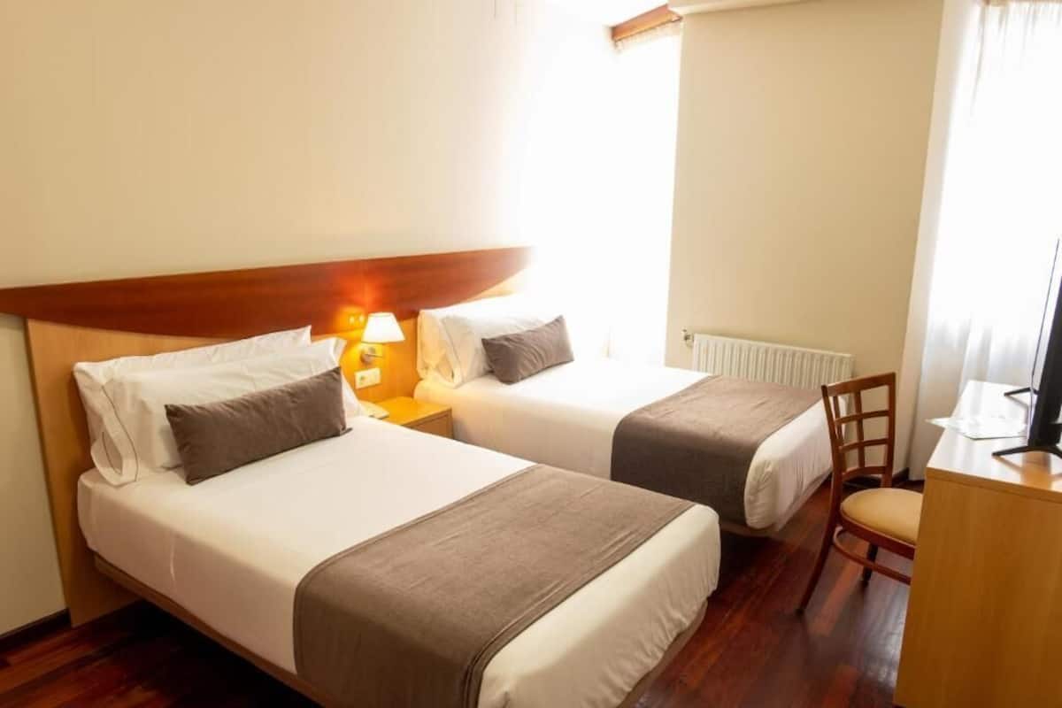 Desk, blackout drapes, iron/ironing board, free WiFi