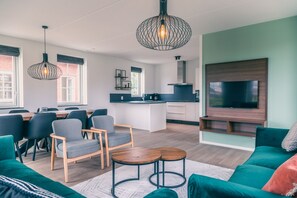 Watervilla 8-persoons | Wohnbereich | Flachbildfernseher