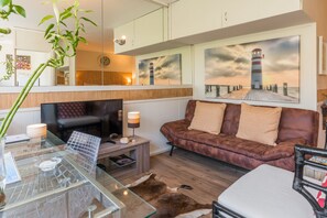 Design Studio Suite, 1 Bedroom, Mountain View | Living room | 38-inch flat-screen TV with premium TV channels, TV - Montclaire Suite 3 (Cape Town)