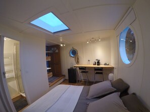 Premium bedding, blackout curtains, soundproofing, free WiFi