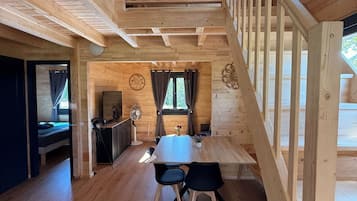 Panoramic Chalet | Living area | 50-cm TV with digital channels