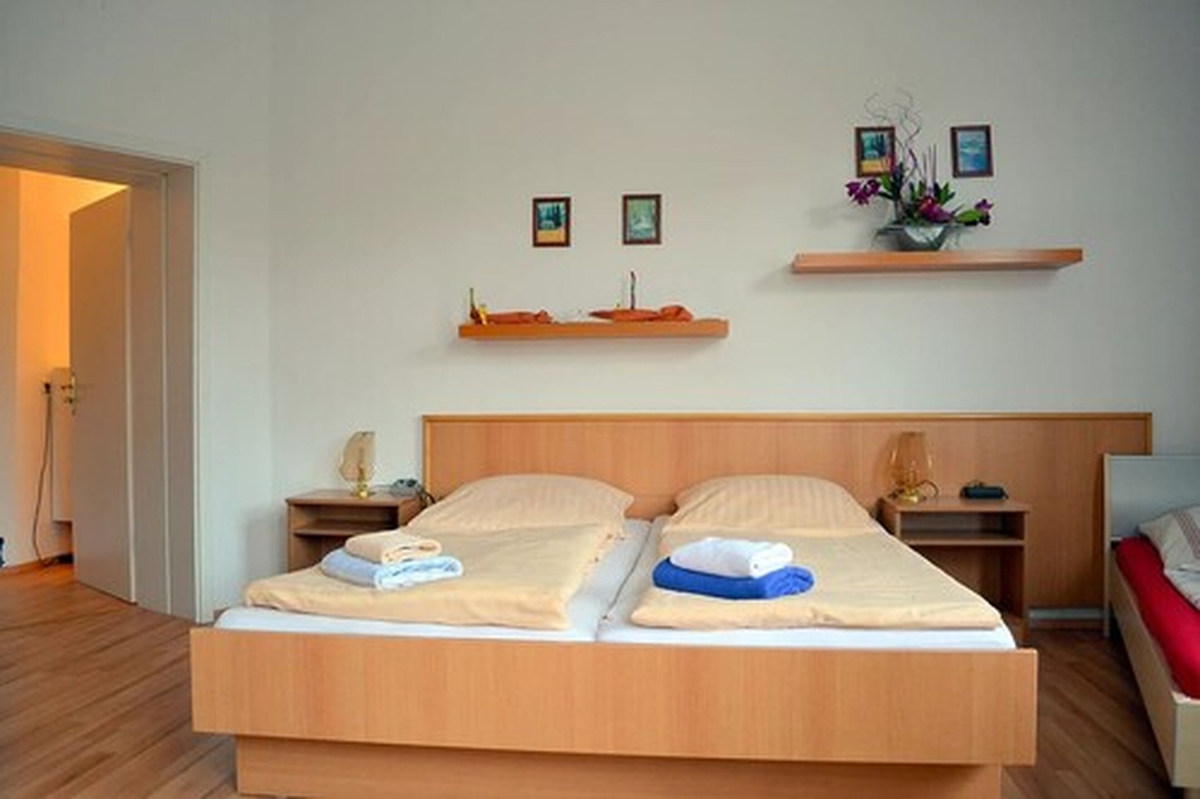 Triple Room, Non Smoking | Blackout drapes, free WiFi, bed sheets