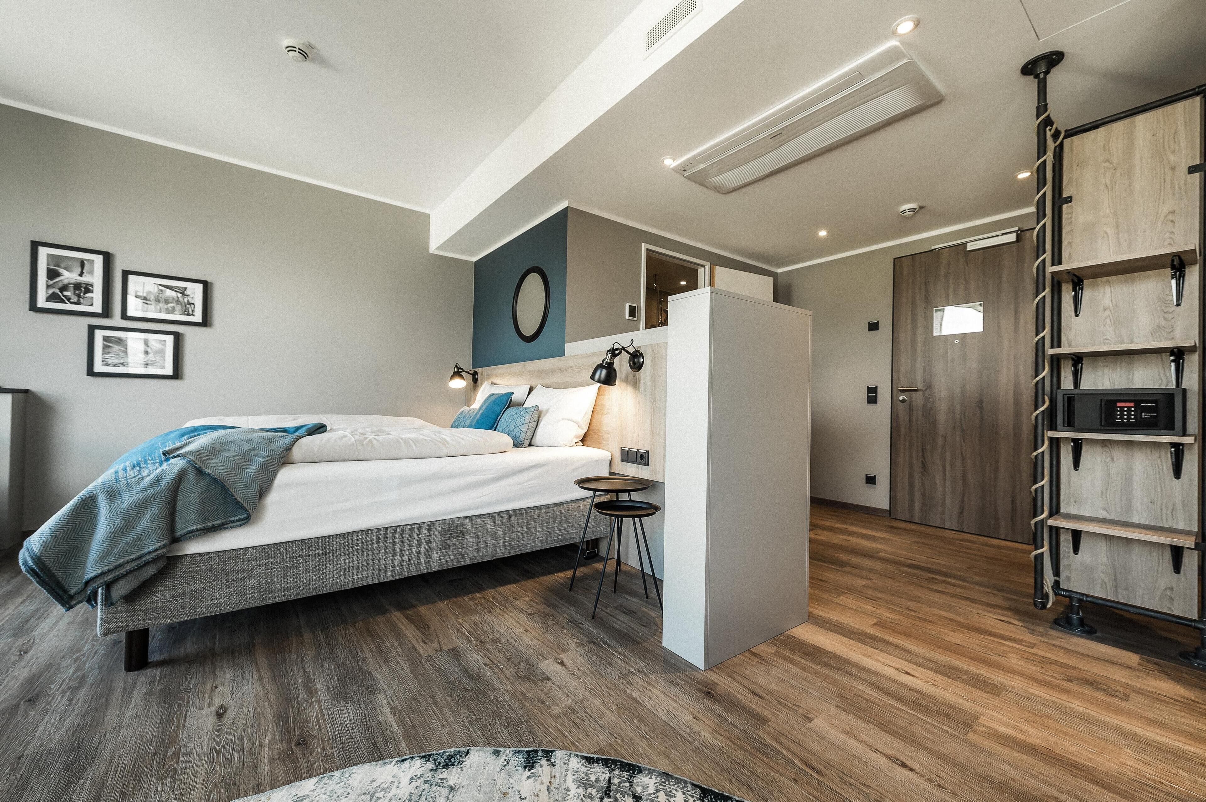 Superior kamer | Luxe beddengoed, een kluis op de kamer, een bureau