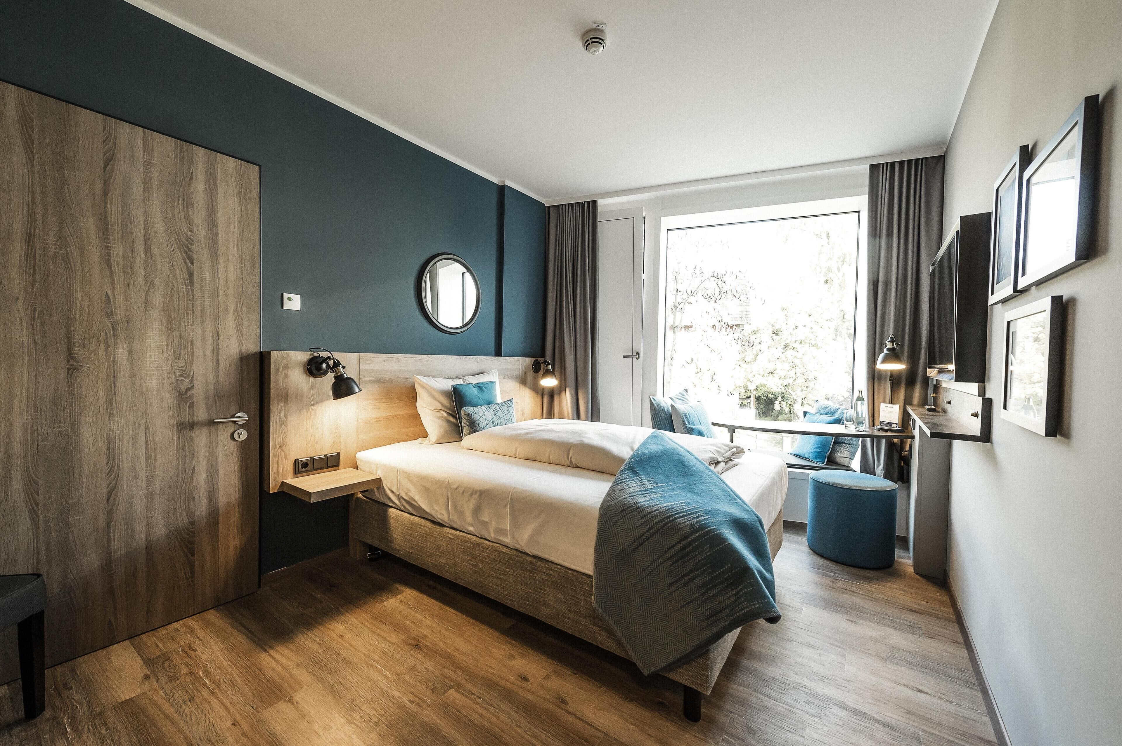 Eenpersoonskamer | Luxe beddengoed, een kluis op de kamer, een bureau