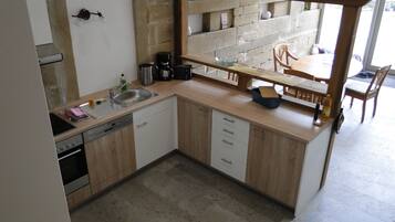 Apartment, 3 Bedrooms | Private kitchen | Full-sized fridge, microwave, oven, stovetop