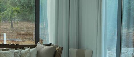 Premium bedding, memory-foam beds, minibar, in-room safe