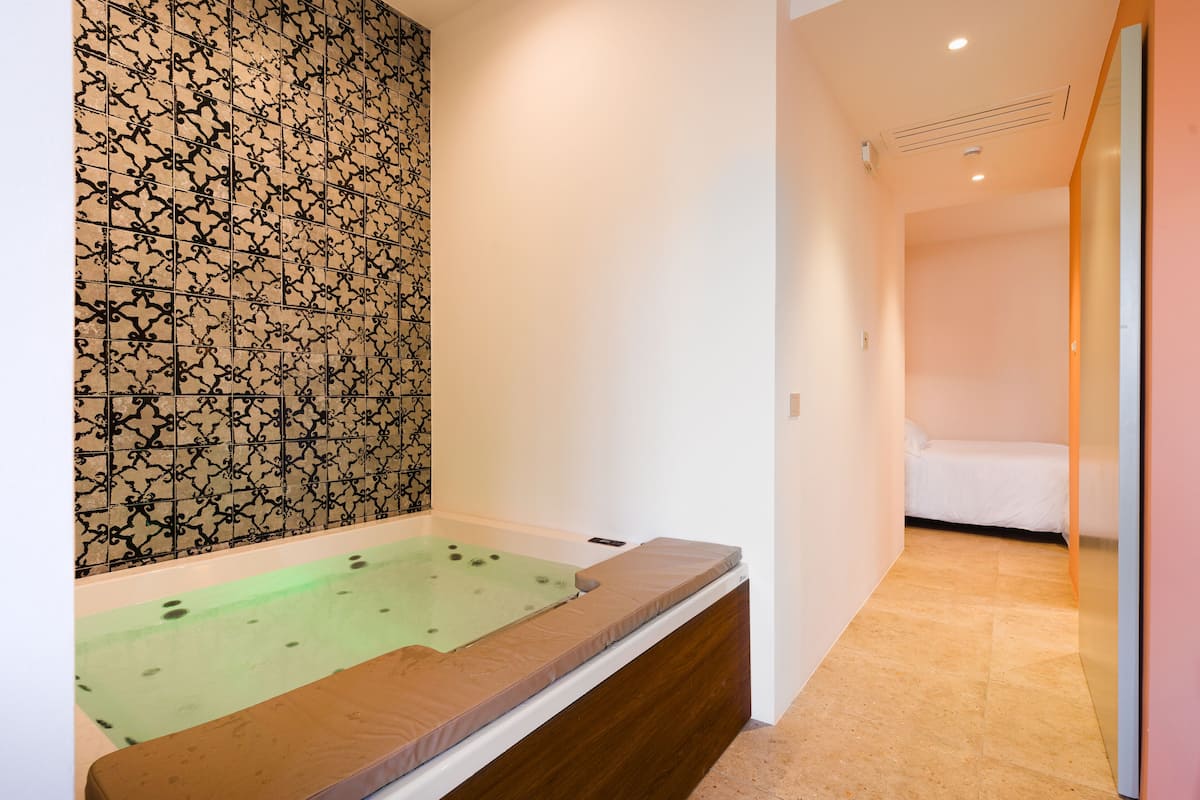 Suite Supérieure | Bain à remous privé