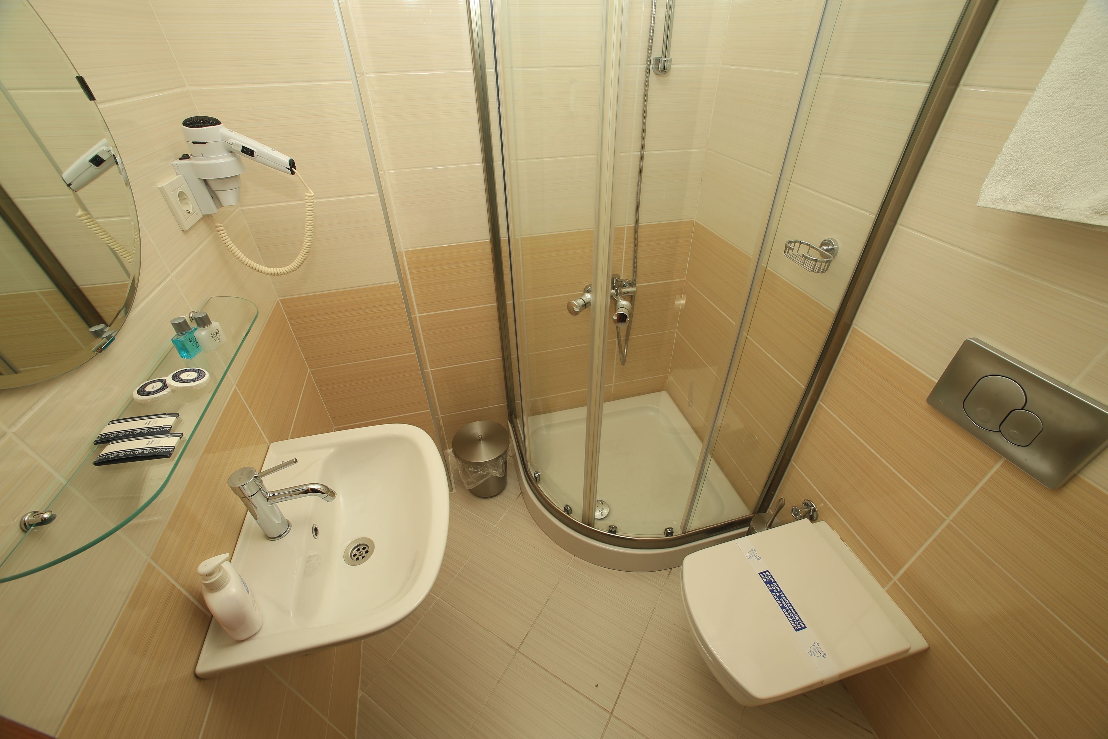 shower, free toiletries, hair dryer, slippers