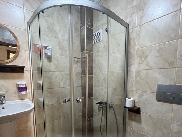 Shower, free toiletries, hair dryer, bathrobes