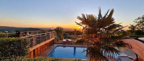Outdoor pool, pool umbrellas, pool loungers