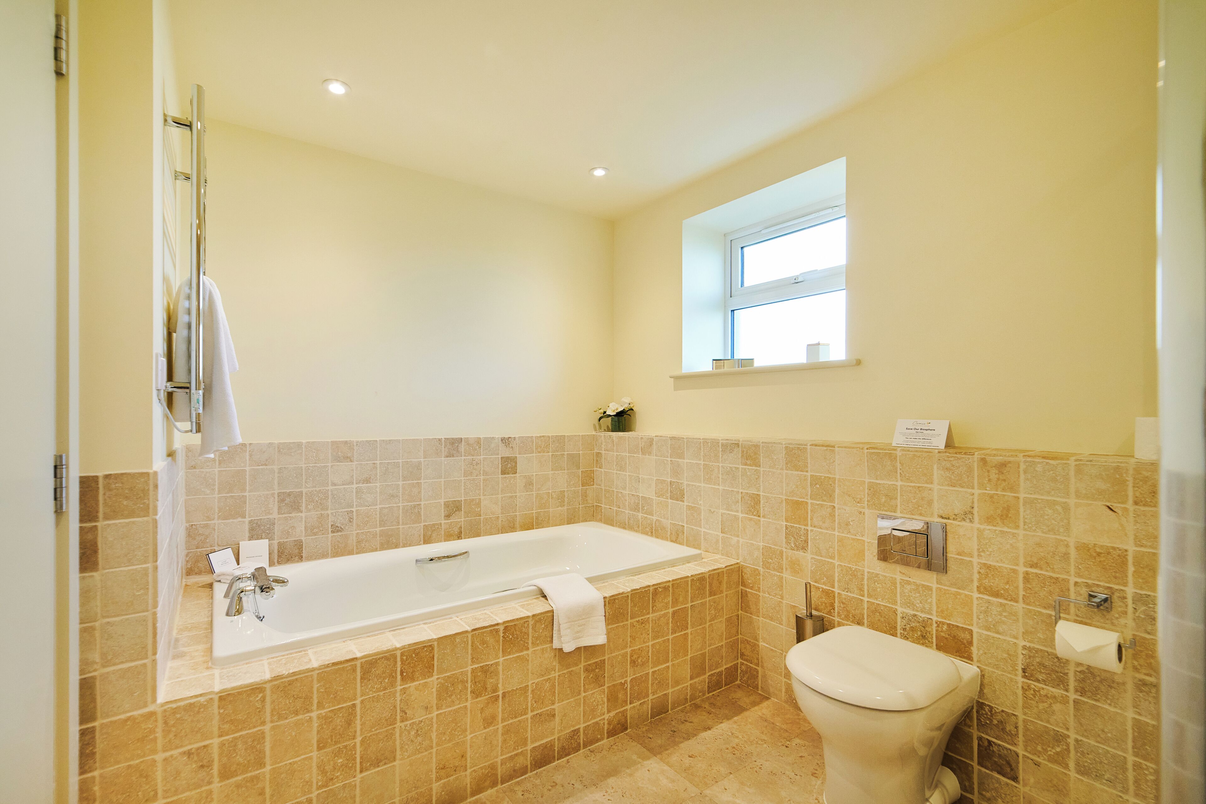 separate bathtub and shower, free toiletries, hair dryer, towels