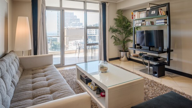 Elite-Apartment, Balkon, Stadtblick | Wohnzimmer