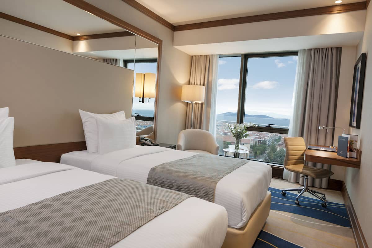 Deluxe Room with 2 Single Beds, Sea View | 1 bedroom, premium bedding, minibar, in-room safe