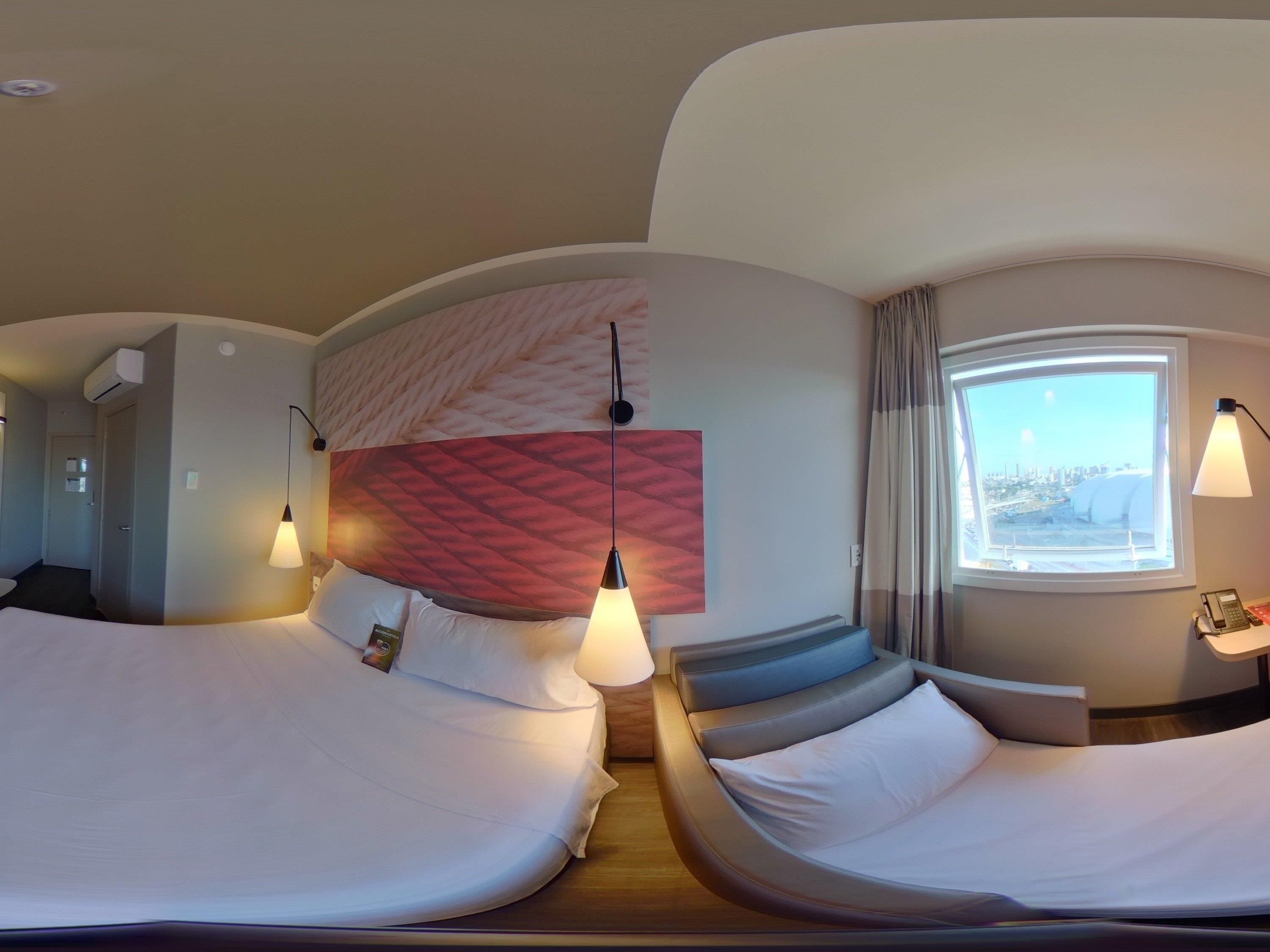 Standard Room, Multiple Beds | Minibar, in-room safe, desk, blackout drapes