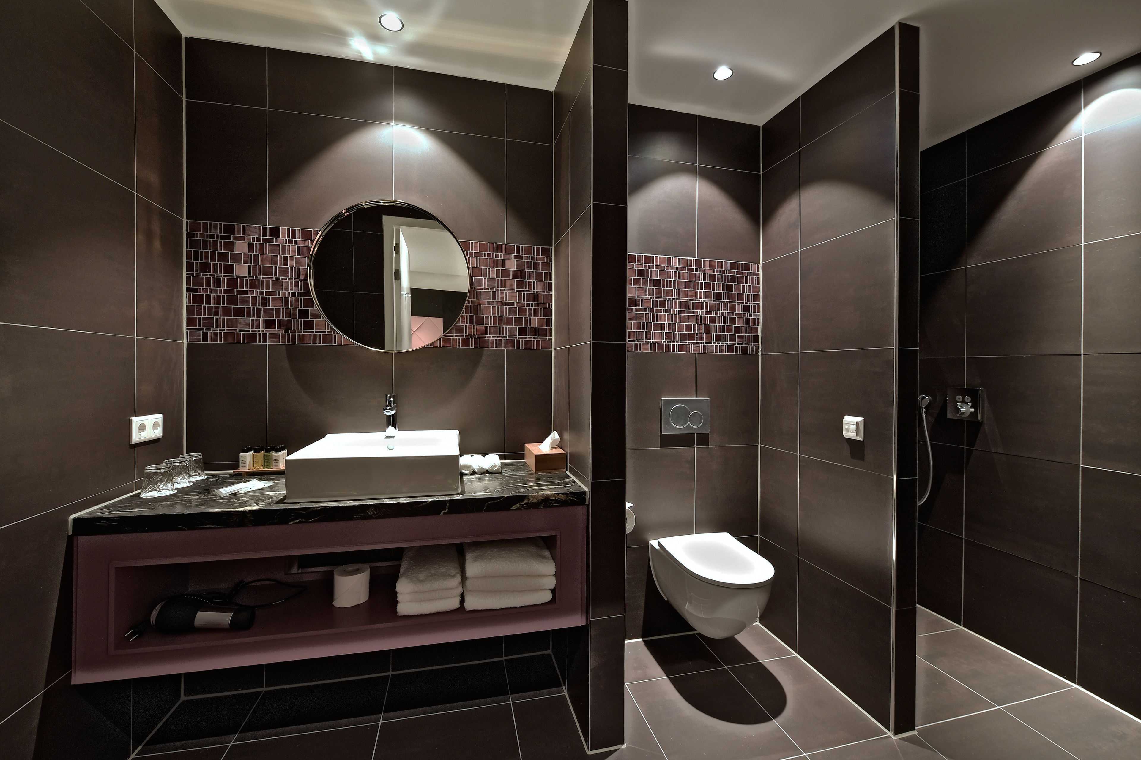 junior suite  | bathroom | shower, rainfall showerhead, free toiletries, hair dryer